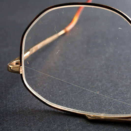 How to remove scratches from prescription glasses with coating?